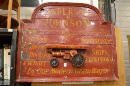 A novelty painted wooden advertising sign.