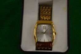 A boxed gent's wristwatch.