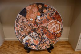 A large Imari charger (faults).