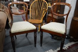 A pair of William IV mahogany dining chairs.
