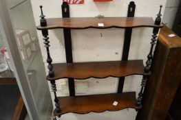 Mahogany wall shelves.