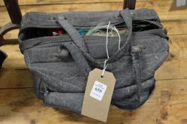 A bag containing fishing equipment.