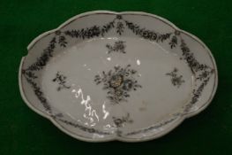 A small porcelain dish.