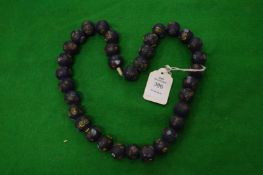 A millefiori glass bead necklace.