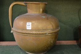 A brass jug.