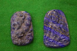 Two Chinese carved and lapis pendants.