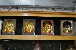 Four unusual Chinese moulded faces.
