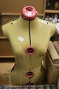 A dressmaker's dummy.