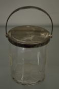 A cut glass and silver mounted preserve jar.