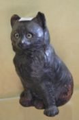 A pottery cat.