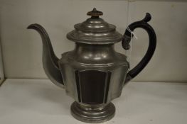 A continental pewter teapot.