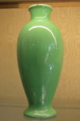 A green pottery vase.