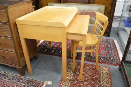 A good modern beechwood desk with pull-out section and matching chair.