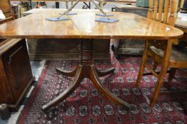 A 19th century mahogany tilt top pedestal breakfast table.
