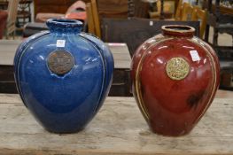 Two decorative Chinese pots.