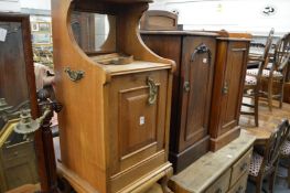 A walnut coal purdonium and two bedside cupboards.