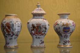 Three small Samson vases.