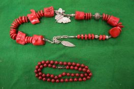 Two decorative necklaces.