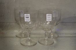 A set of four 19th century cut-glass rummers / wine glasses.