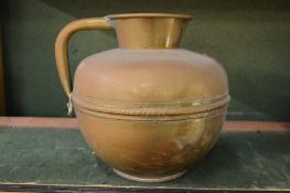 A brass jug.