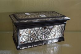 A mother-of-pearl inlaid casket.