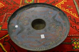 A large Chinese cloisonne dish.