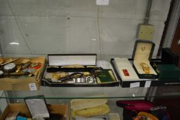 A collection of watches and miscellaneous items.