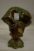 A naturalistically formed Majolica vase.