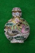 A Chinese enamel snuff bottle.