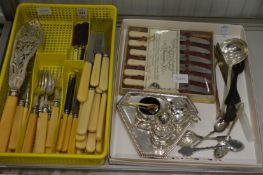 A plated cruet set and other items.