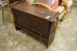 An old oak extending military style camp bed.