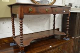 A 19th century mahogany two drawer side table.