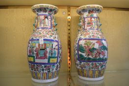 A pair of large Chinese Canton vases.
