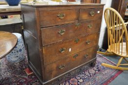 A George III oak chest of drawers.