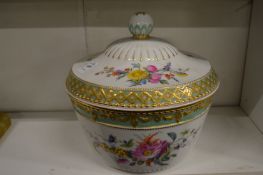 A continental porcelain bowl and cover painted with flowers (AF).