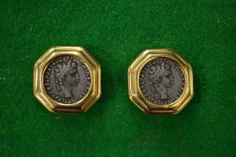 A pair of decorative ear clips.