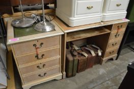 A desk and matching filing cabinet.
