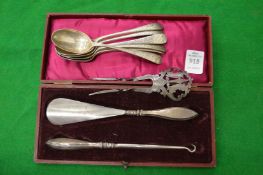 A set of six silver teaspoons and other items.