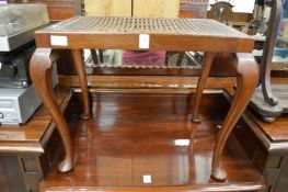 A dressing table stool.