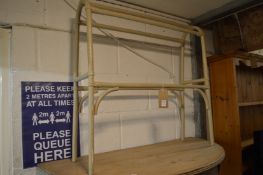 A painted bamboo towel rail.