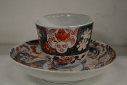 An Imari cup and saucer.