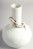 A CHINESE GLAZED POTTERY VASE, with moulded chilong to the neck, 19cm high.