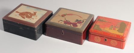 THREE LACQUERED WOOD BOXES, various sizes, (3).