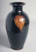 A CHINESE BLACK GROUND GLAZE JIAN WARE VASE. 28.5cm high
