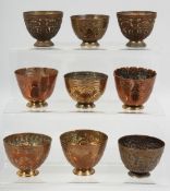 NINE 18TH/19TH CENTURY TURKISH OTTOMAN TOMBAK ZARF CUPS, each approx. 5.5cm diameter, (9).