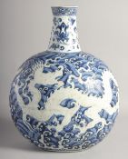 A VERY LARGE CHINESE BLUE AND WHITE PORCELAIN MOON FLASK VASE, decorated with a central dragon