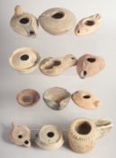 A FINE COLLECTION OF TWELVE CLAY AND TERRACOTTA OIL LAMPS, from tenth to nineteenth century,