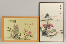 TWO 20TH CENTURY CHINESE EMBROIDERED SILK PANELS, one with peacocks, the other with a mountain view,