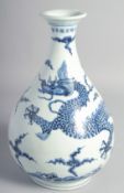 A CHINESE BLUE AND WHITE PORCELAIN YUHUCHUNPING VASE painted with a dragon amongst stylised