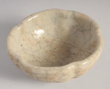 A SMALL CHINESE CRACKLE GLAZE BOWL, 11cm diameter.